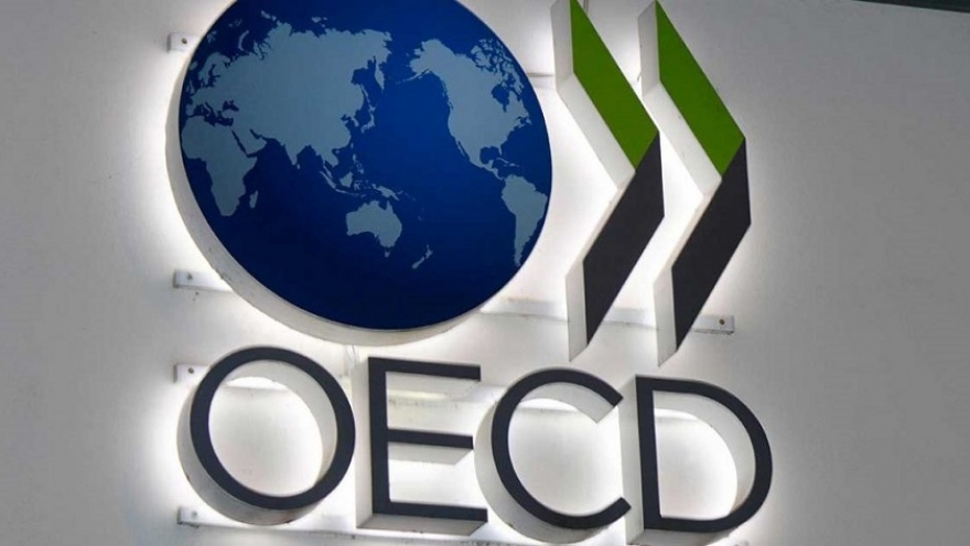 OECD điều chỉnh triển vọng tăng trưởng kinh tế toàn cầu
