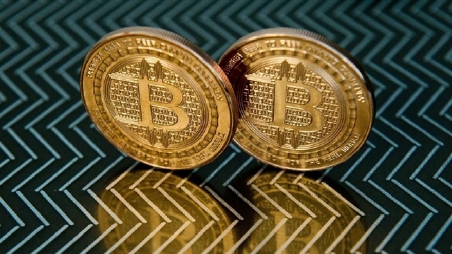 Bitcoin vượt 61.000 USD, lập đỉnh lịch sử mới