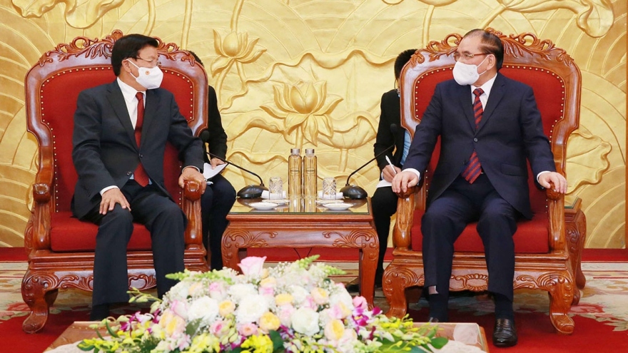 Tổng Bí thư, Chủ tịch nước Lào gặp nguyên TBT Nông Đức Mạnh và nguyên CTN Trần Đức Lương