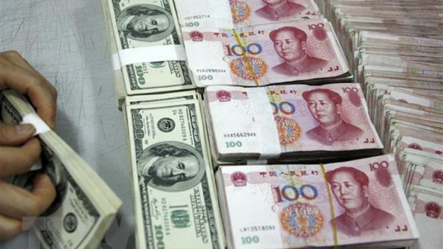 Đồng nhân dân tệ Trung Quốc giảm xuống mức kỷ lục so với đồng đô la Mỹ