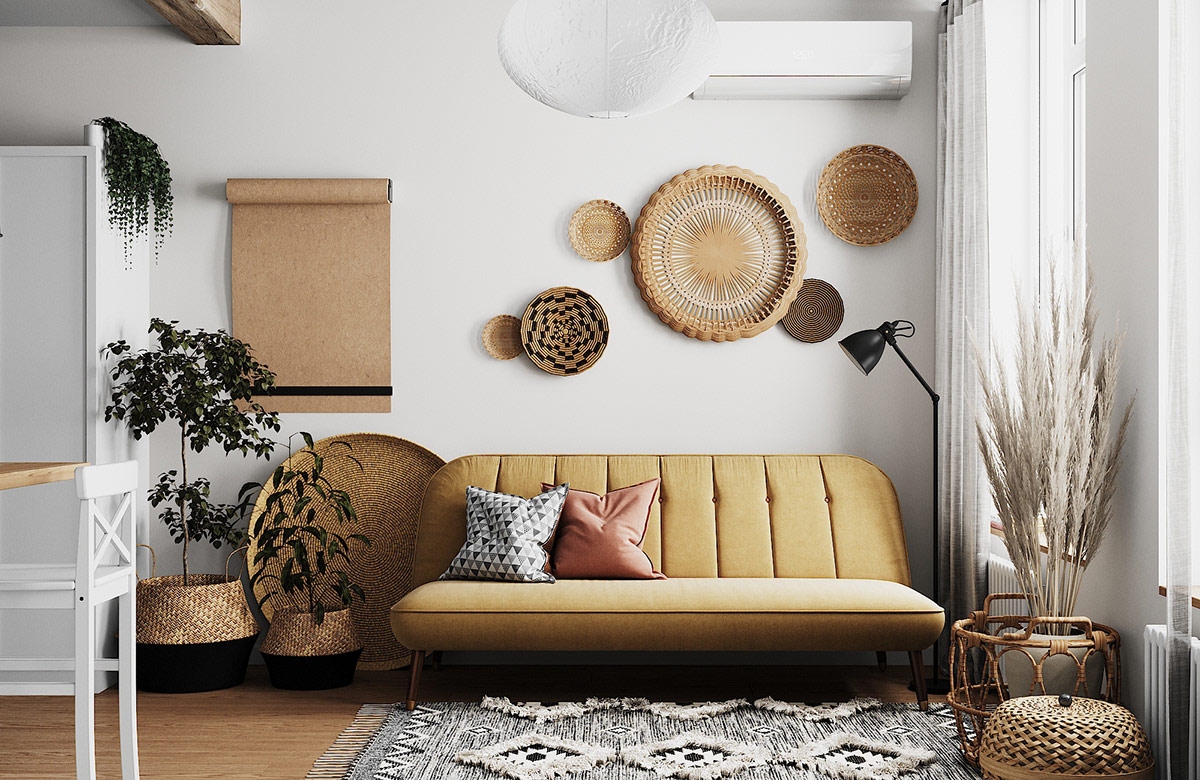 Ghế sofa màu nâu nhạt phù hợp với màu sắc của những vật dụng trang trí bằng mây tre đan trong phòng.