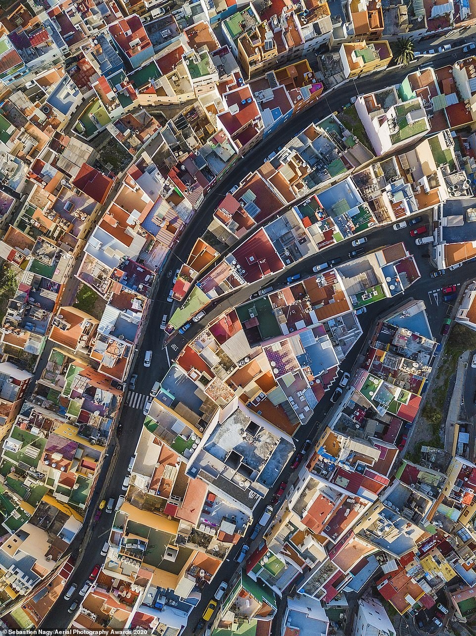 The colourful roofs of Las Palmas de Gran Canaria can be seen in a shot by Sebastien Nagy that ultimately compelled judges to award it first prize in the Cityscapes category.