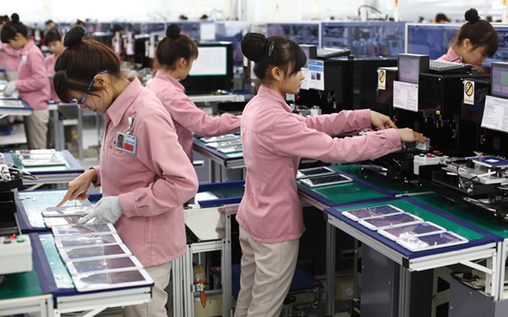Việt Nam được đánh giá là điểm đến hấp dẫn đối với doanh nghiệp nước ngoài, trong đó có Hàn Quốc. (Ảnh minh họa: Công nhân tại nhà máy Samsung Việt Nam)