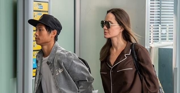 Angelina Jolie mặc pyjama đi du lịch cùng con trai Pax Thiên
